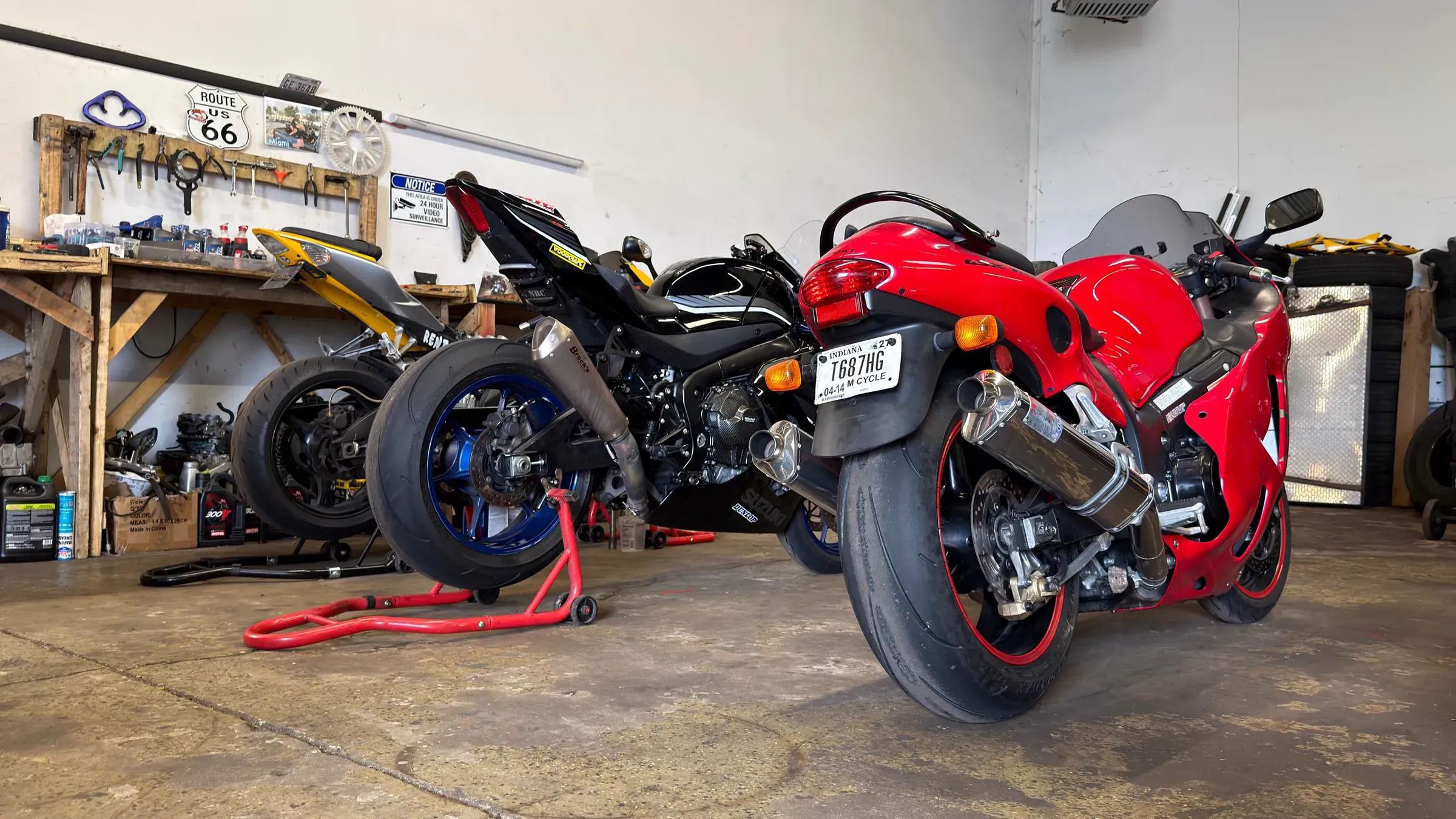Sportbikes on paddock stands inside TT Sport Garage in Carol Stream, IL